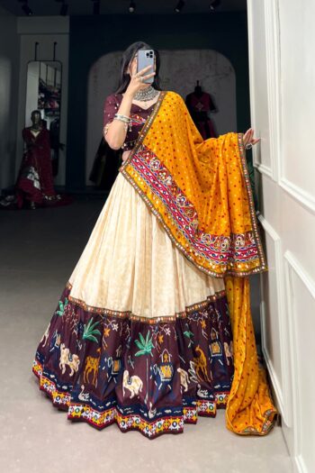 Vibrant Heritage: Dola Silk Gamthi Work Navratri Lehenga