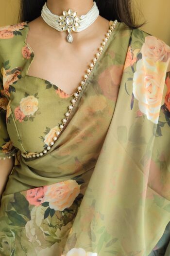 Elegance Redefined Georgette Printed Saree with Pearl Lace