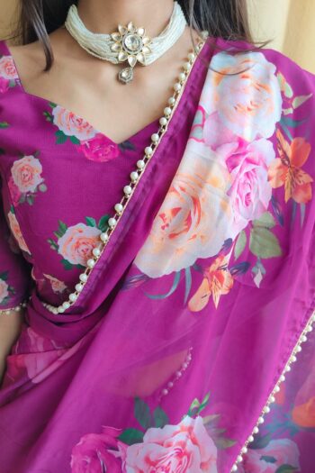 Elegance Redefined Georgette Printed Saree with Pearl Lace